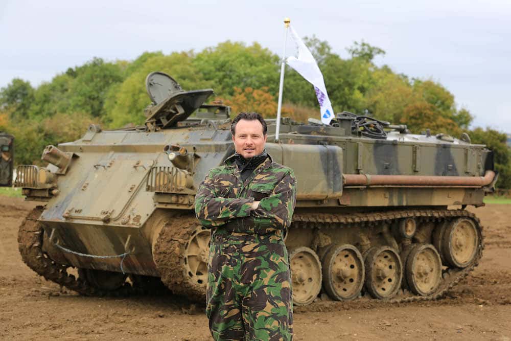 The Car Expert, posing heroically in from of an FV432 armoured personnel carrier