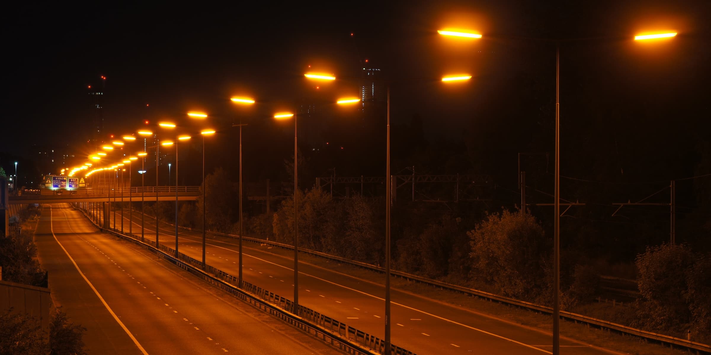 Why are most street lights orange and not white?