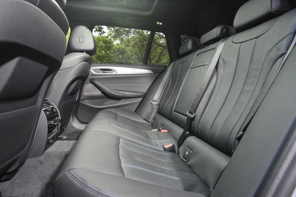 2019 BMW 530i Touring review rear seats | The Car Expert