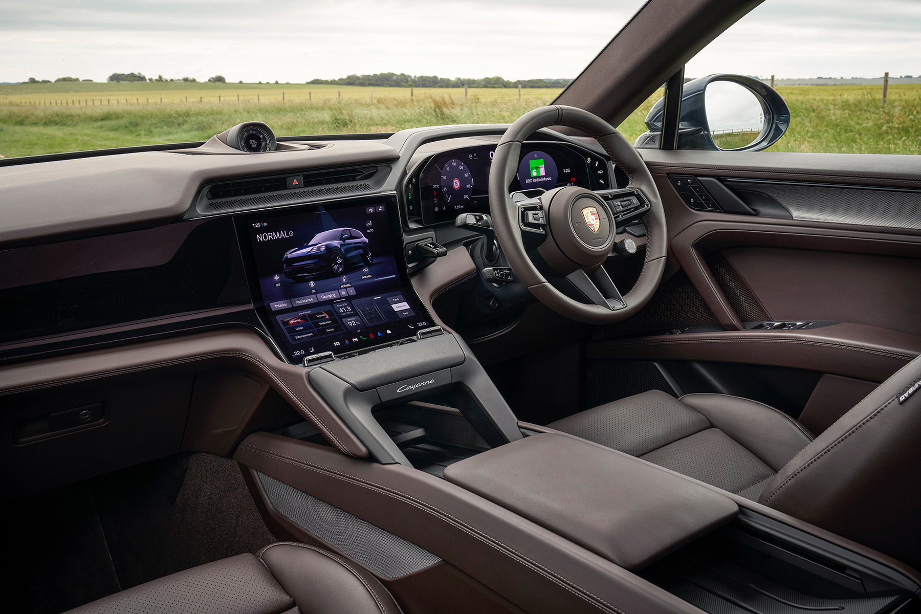 Porsche Cayenne Electric front interior view | Expert Rating